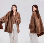 معاطف فرو المنك للنساء